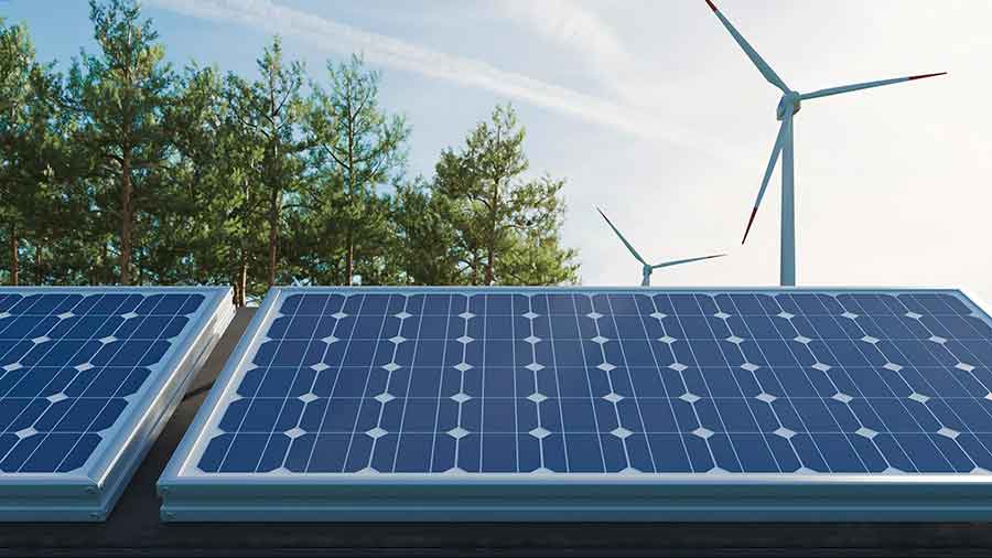 Imagen con paneles solares y molinos de viento.